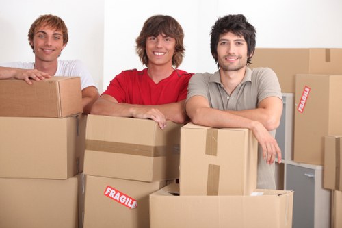 Careful loading of furniture into a moving van in London
