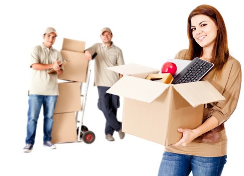 Packed office furniture and equipment ready for relocation