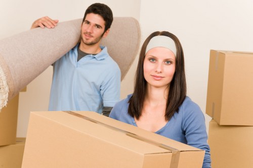 Local moving team handling boxes and household items
